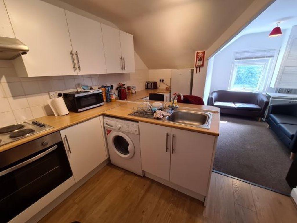 A modern, well-maintained kitchen with ample st...