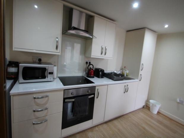 A modern, well-maintained kitchen with clean su...