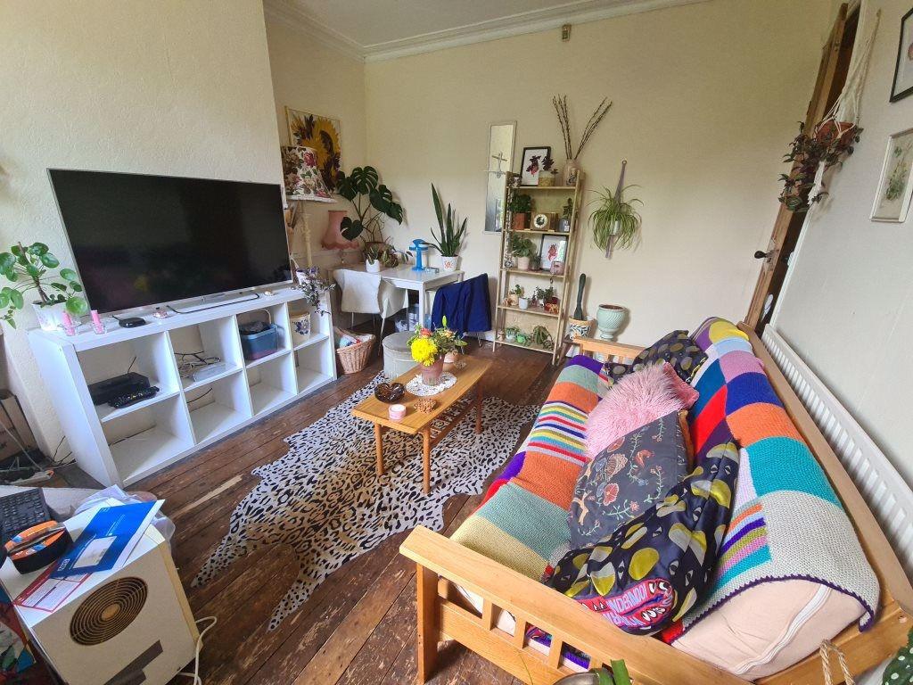 A cozy and inviting living room filled with nat...
