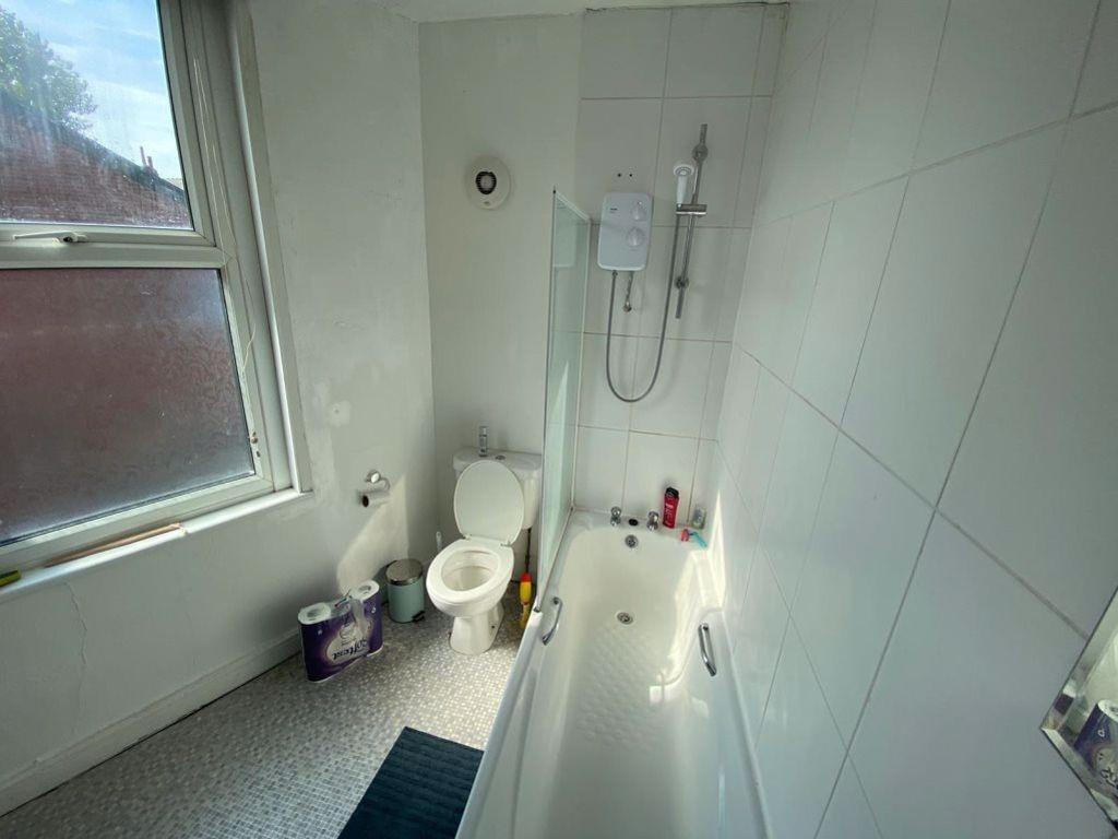 A clean and well-maintained bathroom featuring ...