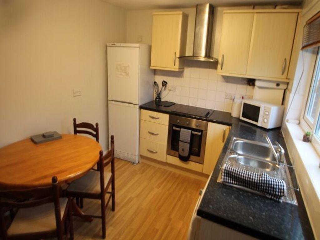 A bright and well-maintained kitchen featuring ...