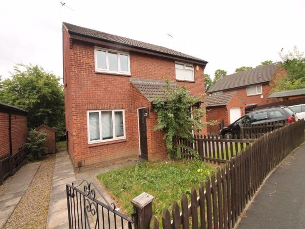 A charming red brick house with well-maintained...