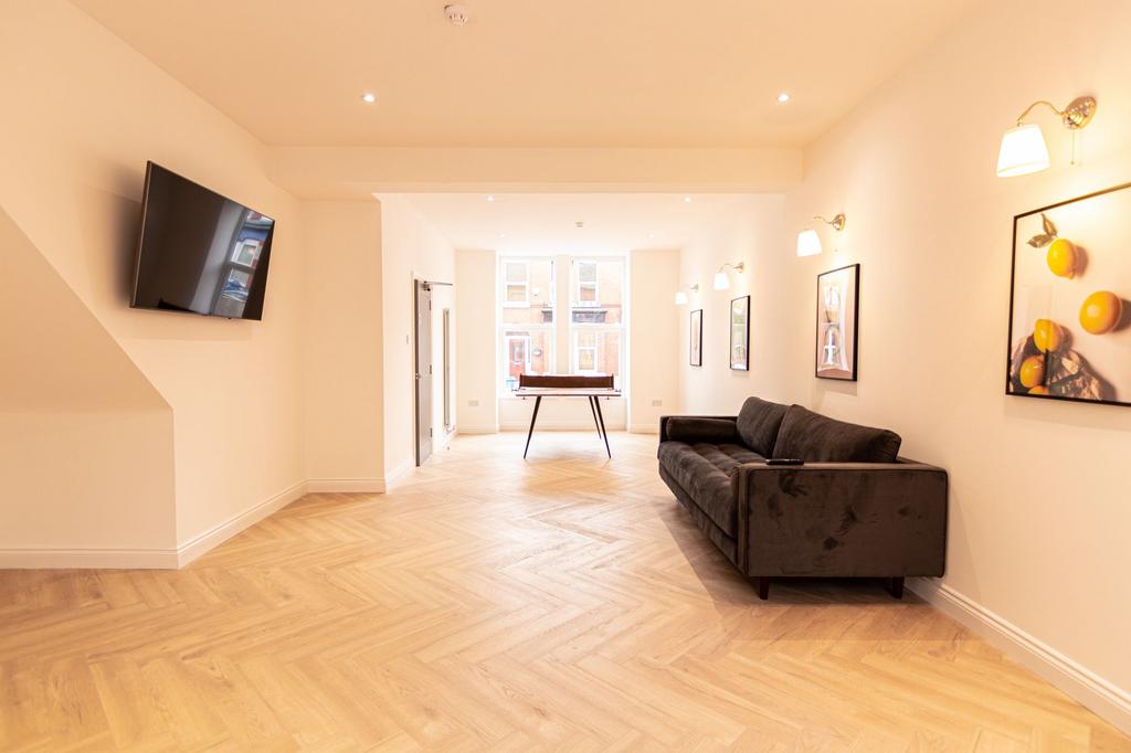 Bright and inviting living room featuring a lar...