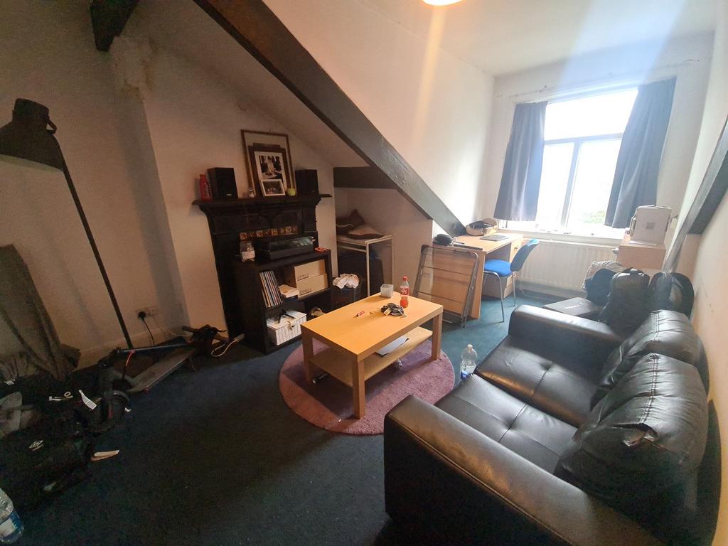 A cozy living room featuring comfortable seatin...