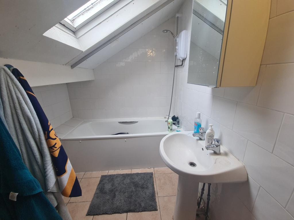 A clean, well-maintained bathroom featuring a b...