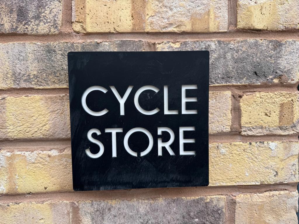 Maythorn house cycle sign