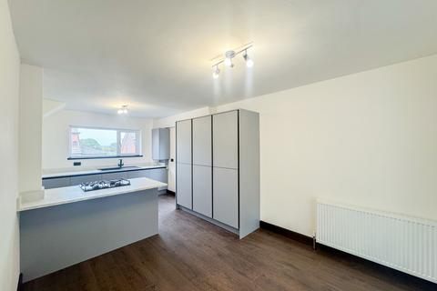 26 Clitheroe Drive, Bury, BL8 2JU