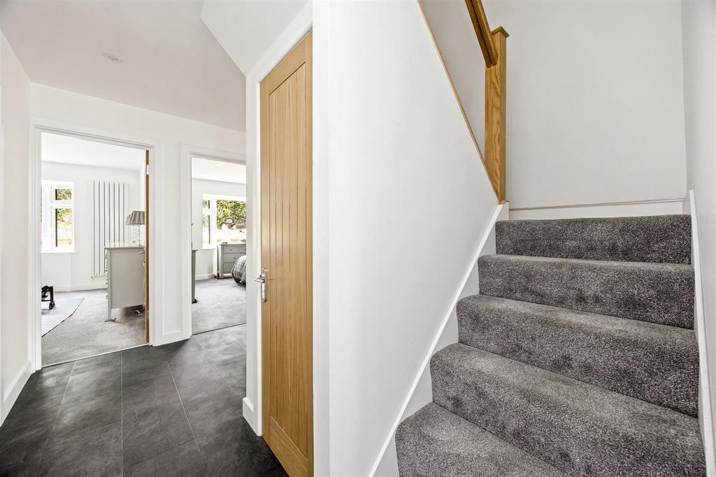 Stairs rising to First Floor