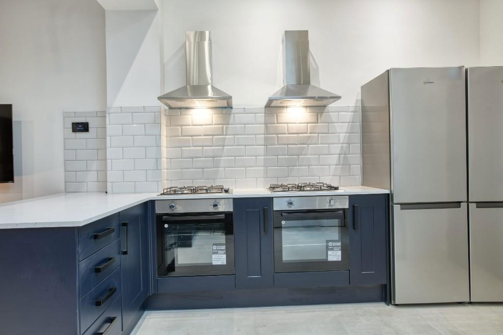 Modern and well-equipped kitchen featuring two ...