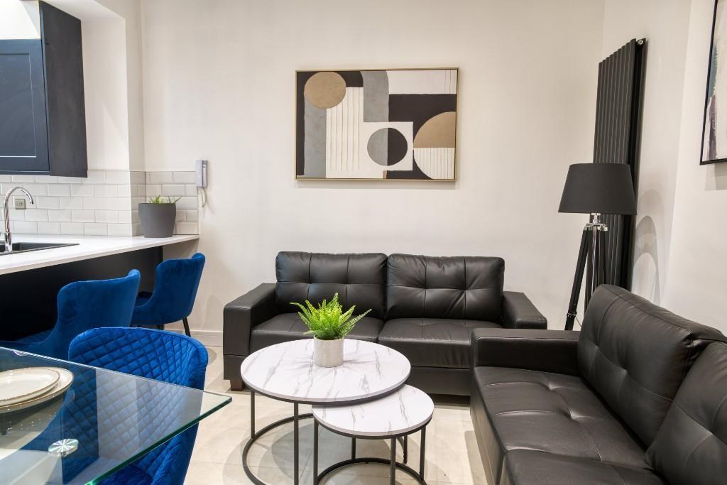 A modern and inviting living room with comforta...