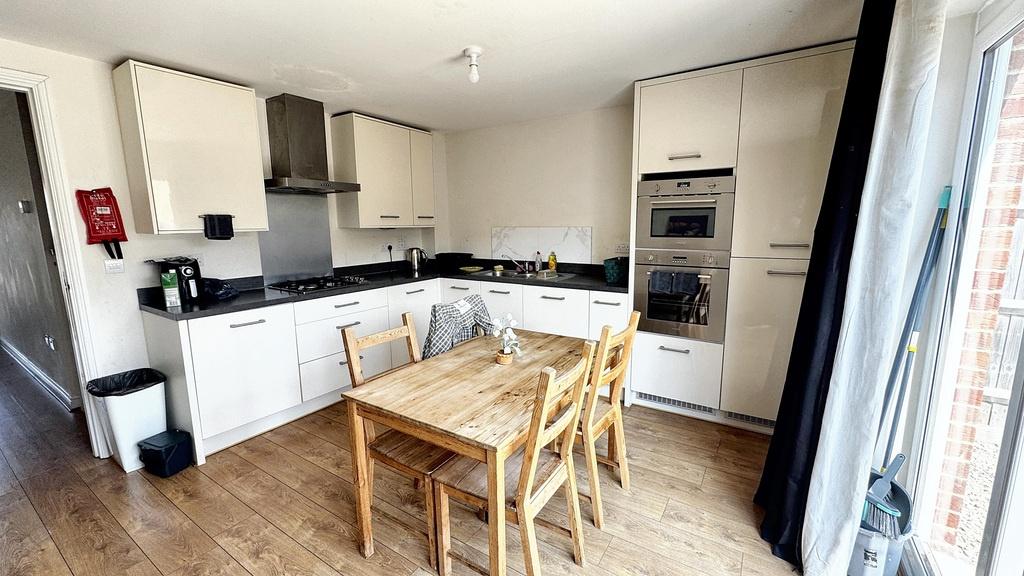 A bright and well-maintained kitchen featuring ...