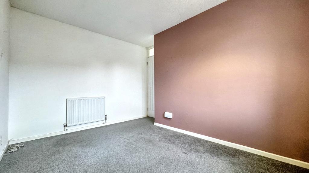 A bright and inviting living room featuring a s...