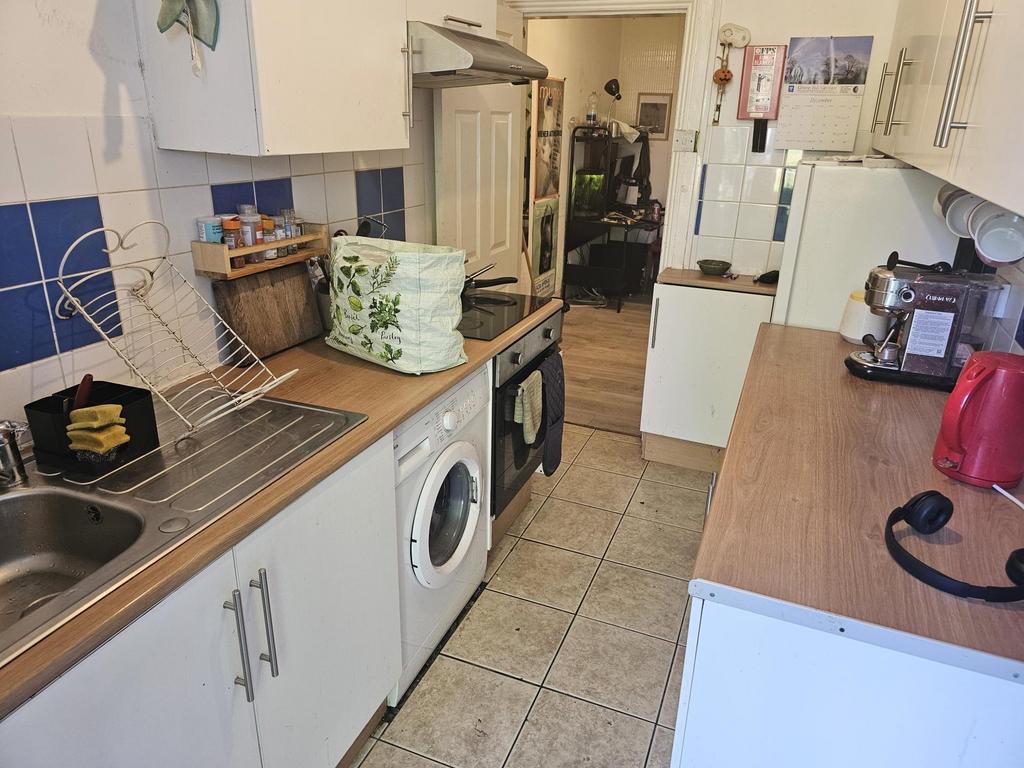 A well-organized kitchen area featuring essenti...
