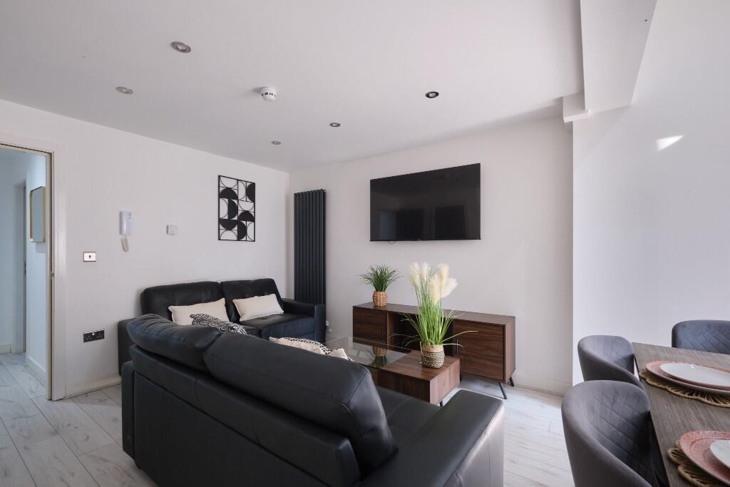 A modern and inviting living room featuring a l...