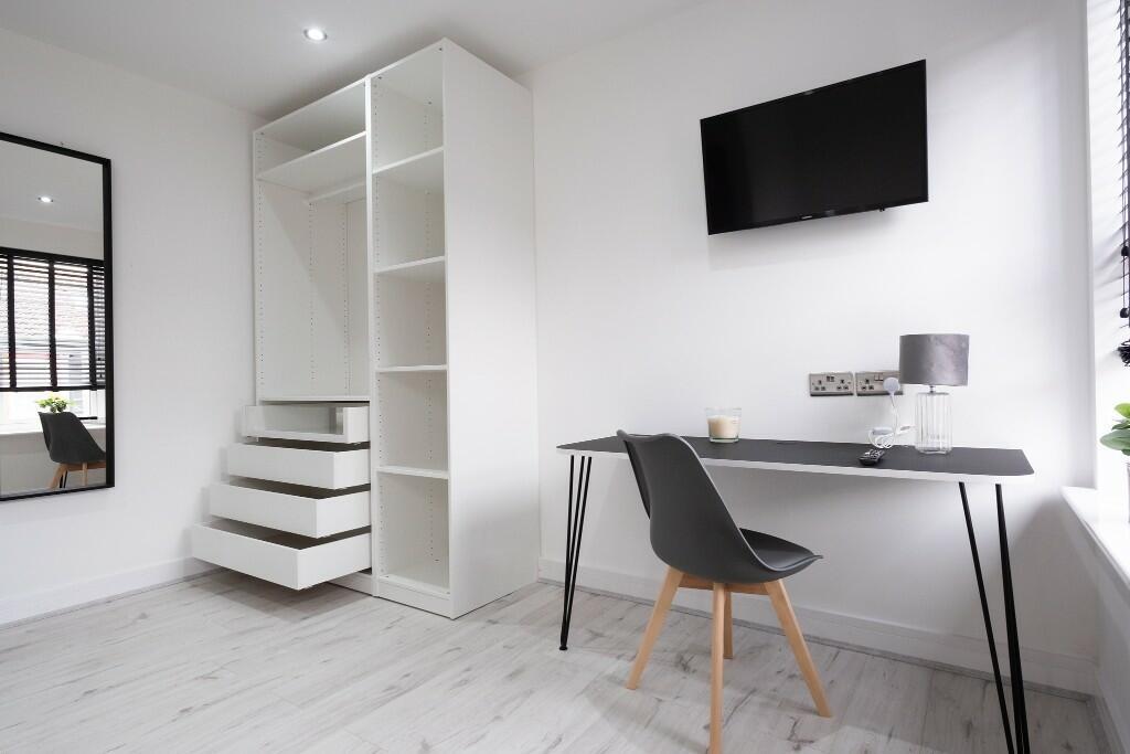 A modern, well-lit student accommodation space ...