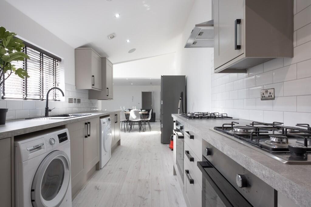 Modern and bright kitchen space featuring ample...