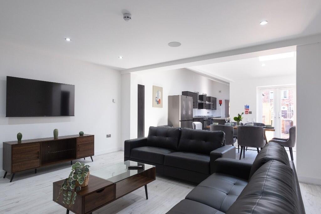 Modern and spacious living room with contempora...