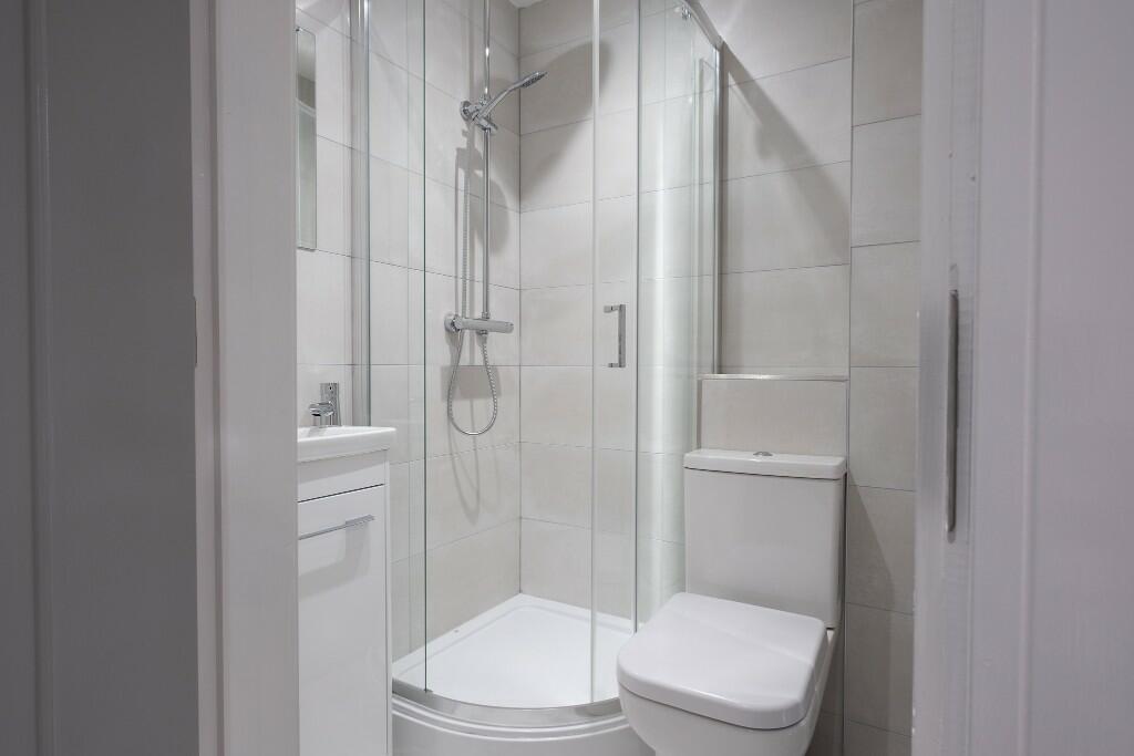 A modern and well-maintained bathroom featuring...