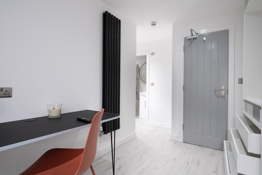 A modern, well-maintained bathroom with a spaci...