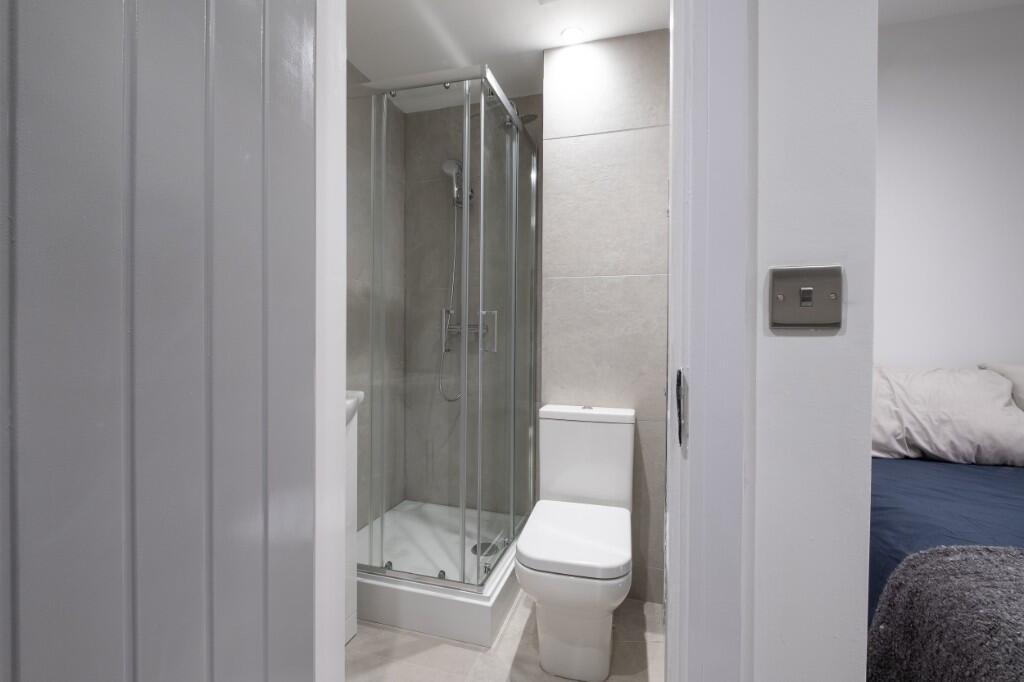 A modern, well-maintained bathroom featuring a ...