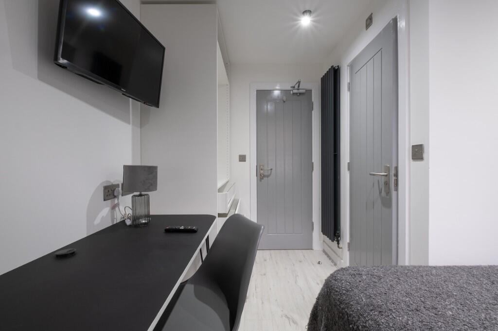 A clear exterior shot of the front of a modern ...