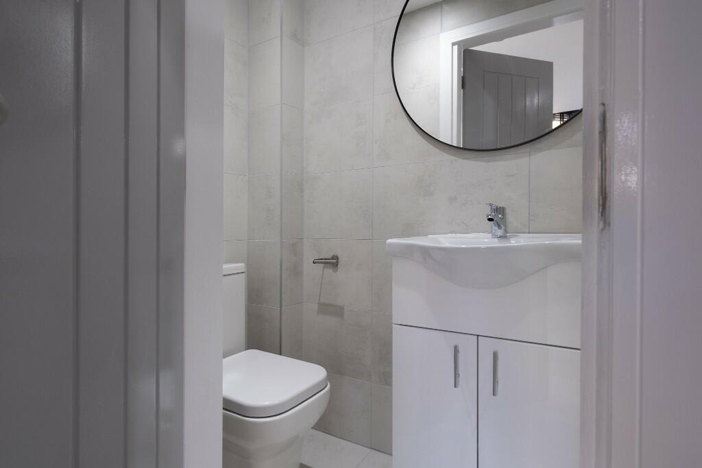 A clean and well-maintained bathroom with a mod...