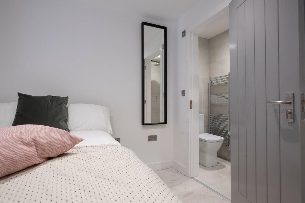 A modern, well-maintained bathroom featuring a ...