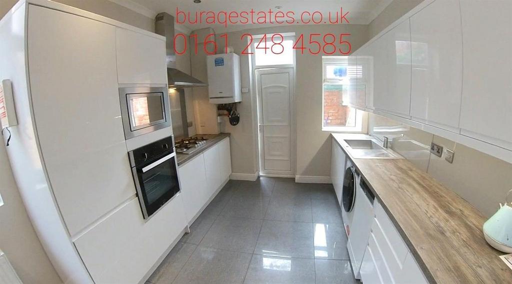 Bright and modern kitchen featuring clean count...