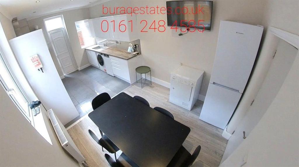 A bright and modern living room featuring ample...