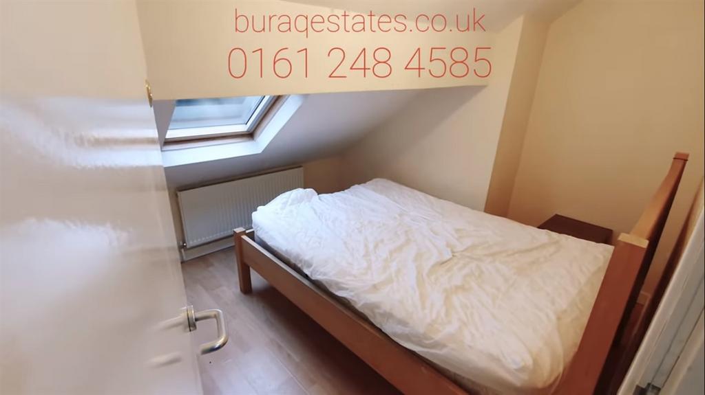 Neat single bedroom with a comfy bed beneath a ...