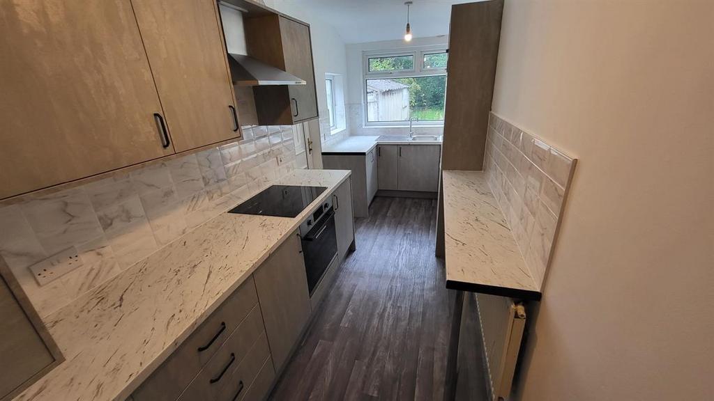 A modern kitchen with ample counter space and n...