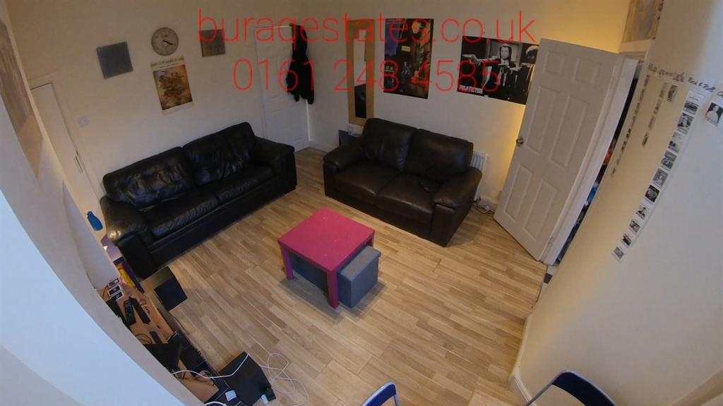 Bright, modern communal living area with two bl...