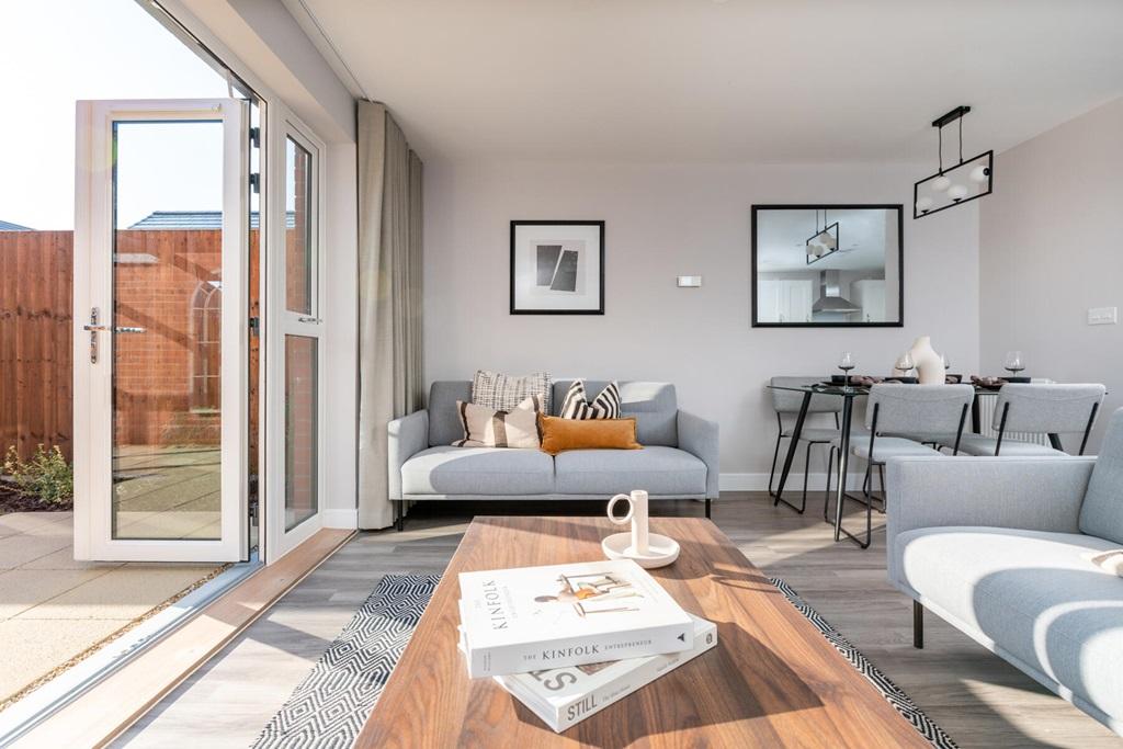 French doors open up the space and let the...