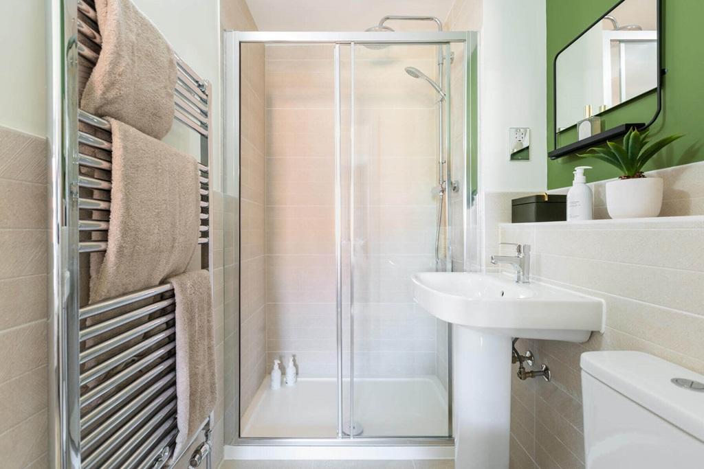 Bedroom 1 also features a private en suite...