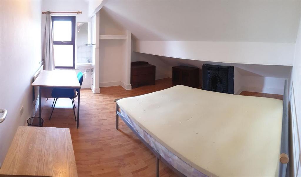 Bright double bedroom with sloped ceiling, larg...