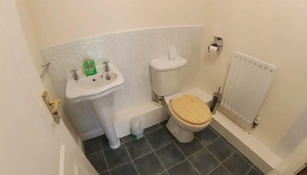 A clean and functional bathroom featuring a toi...