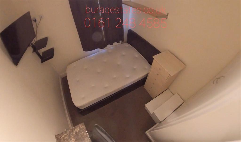 A modern bathroom with a large bath and clean f...