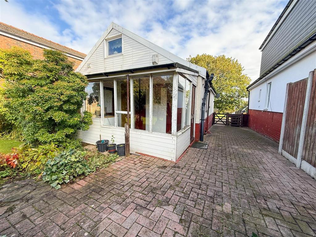 Utility porch and sunroom