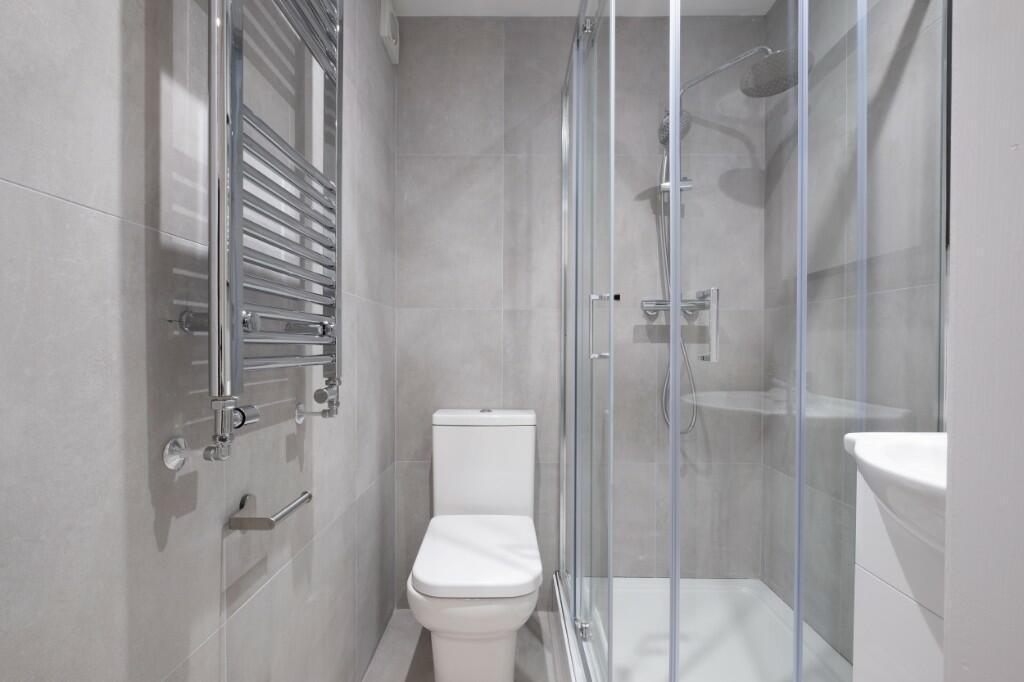 A modern, well-maintained bathroom featuring a ...