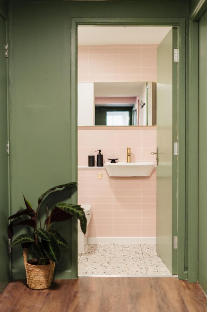 Modern and neatly maintained bathroom with soft...