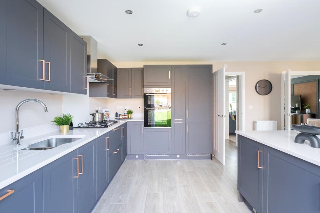 There's ample worktop and storage space in the...