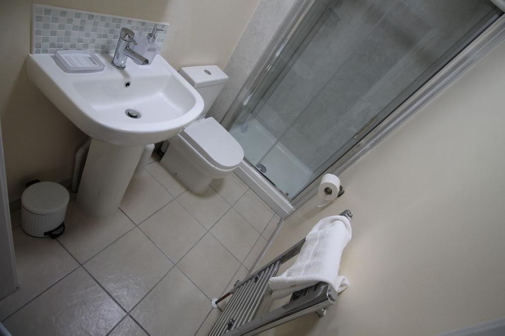 A clean and well-maintained bathroom with a mod...