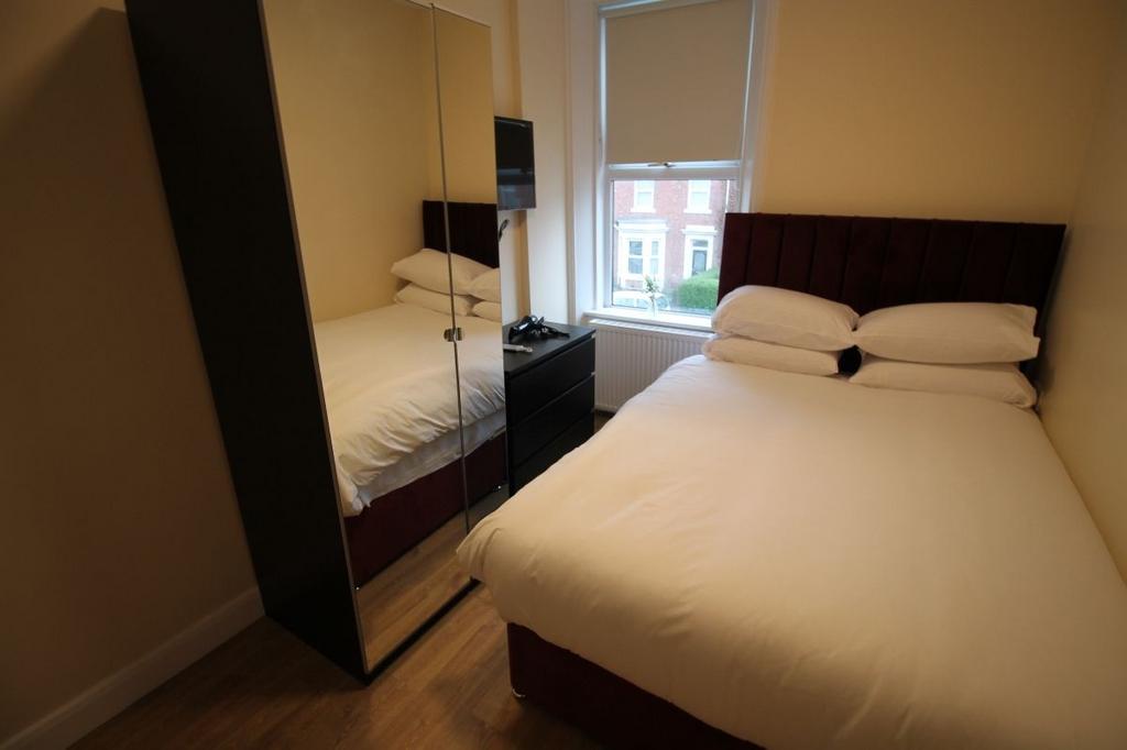 A bright and neatly presented double bedroom fe...