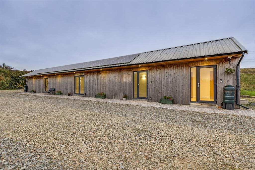 The Long Barn by Night