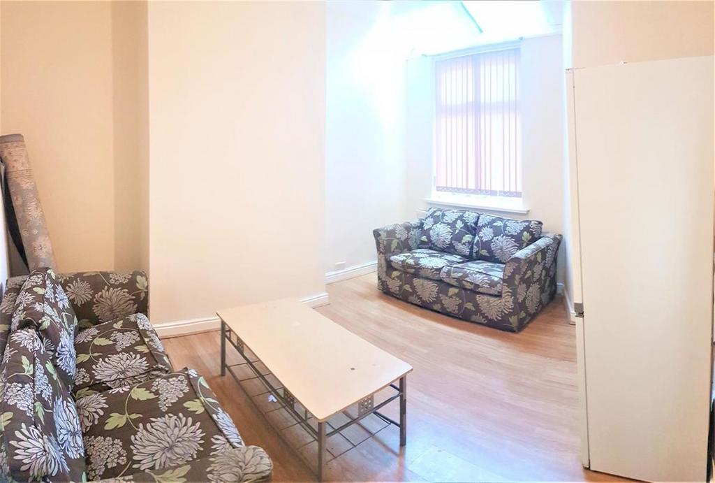 Bright furnished living room with matching flor...