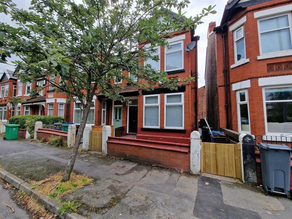 Well-maintained red-brick terraced house with b...