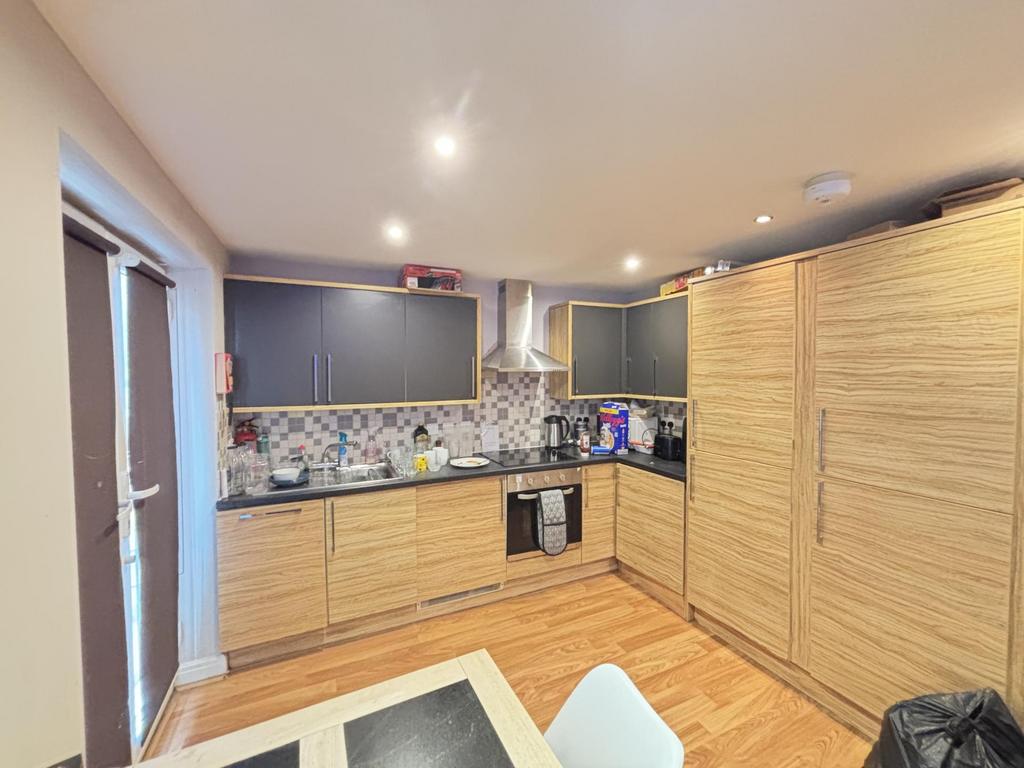 Modern kitchen with ample workspace, integrated...