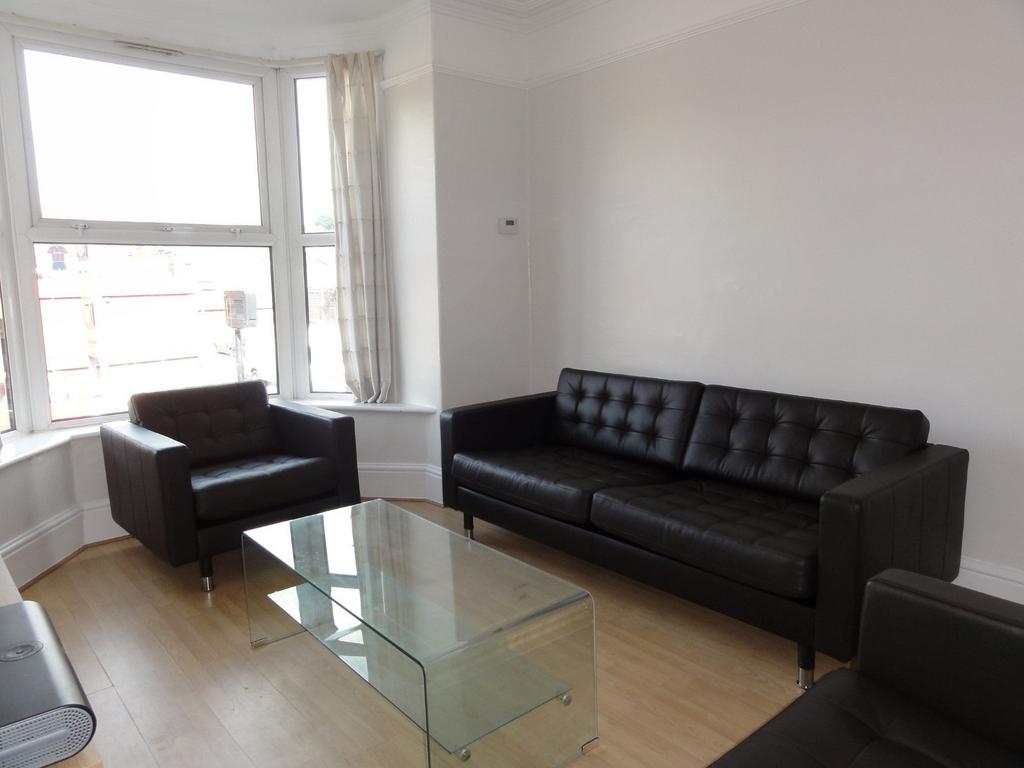 Bright and spacious contemporary living room fe...