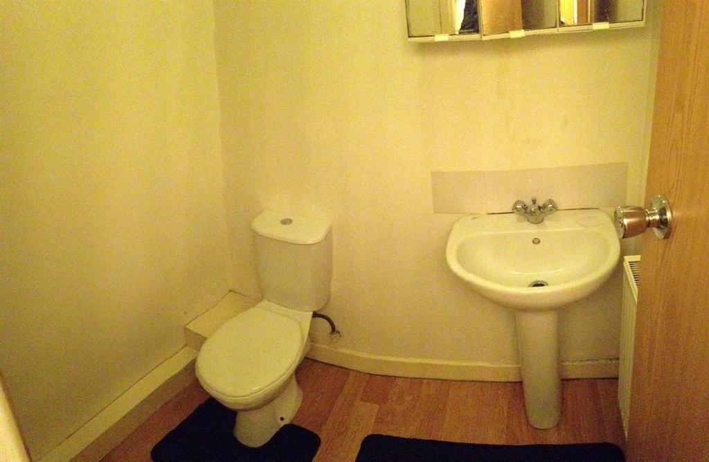 Compact WC with a standard toilet and pedestal ...