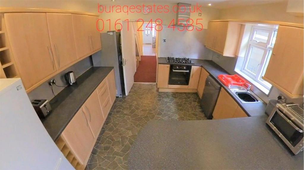 Spacious kitchen with modern appliances and am...